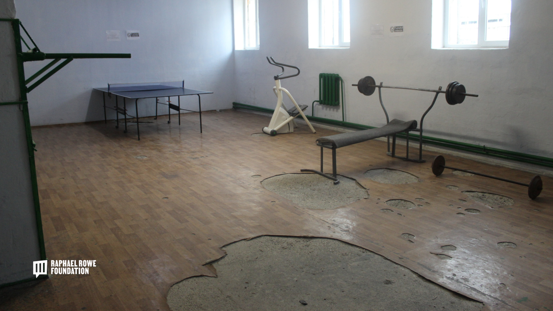 Current state of Moldova gymnasium showing worn facilities needing renovation